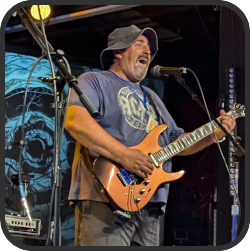 Tony Caravello - Vocals and Guitar